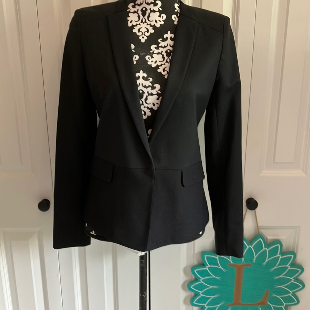 Fabulous classic black blazer with one button hidden closure at front